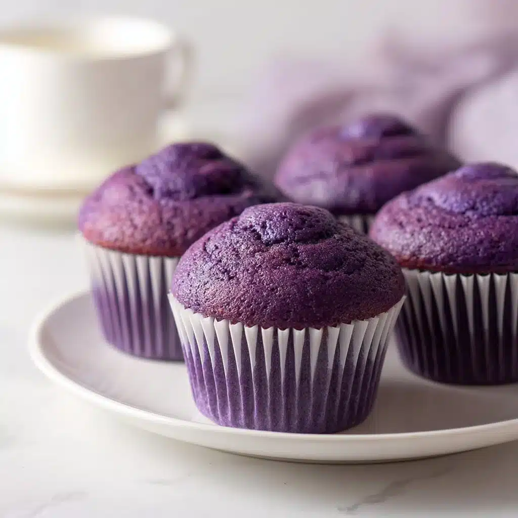 Soft, Vibrant, and Just Sweet Enough Ube Cupcakes 3 Delicious soft ube cupcakes showcasing vibrant purple color and sweet icing