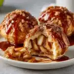 Gooey caramel apple pie bombs ready to be enjoyed as a delicious dessert